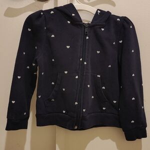 H&M Black Hoodie with White Heart Pattern